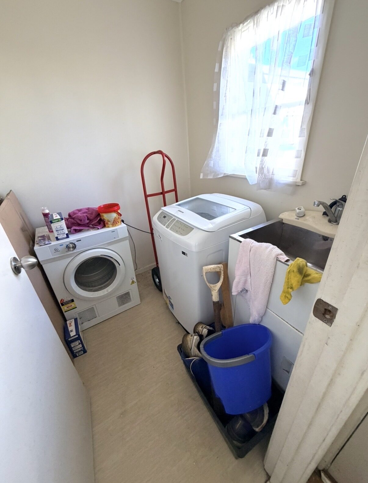 Laundry before renovation, Auckland
