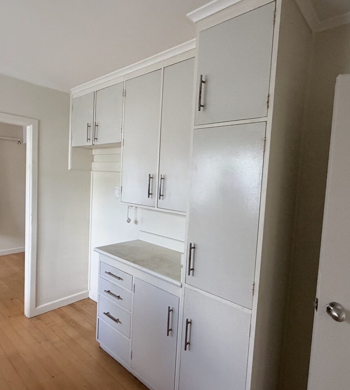 Kitchen pantry and storage wall before renovation, Auckland